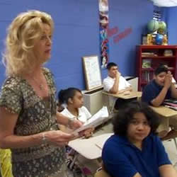 teacher in a classroom with students